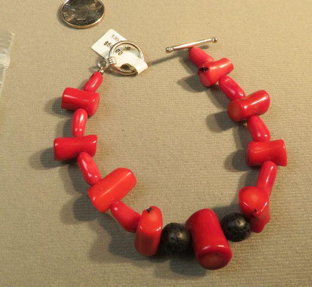 7 1/2" bracelet - enhanced coral & lava beads w/sterling toggle clasp
