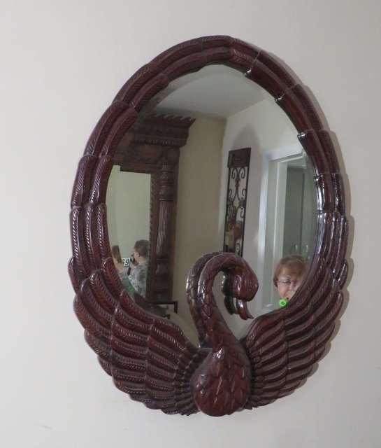 mahogany framed ornately carved swan mirror  31" x 41"