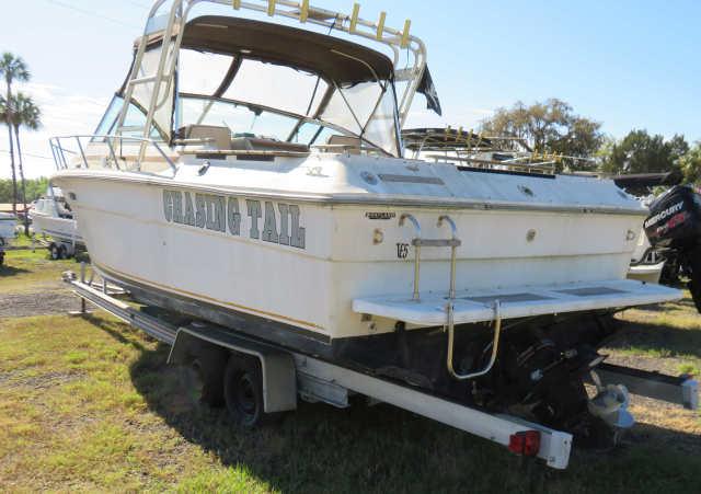 1981 25' SeaRay cabin cruiser with Mercruiser Bravo I/O and trailer