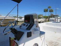 2002 Refurbished Carolina Skiff 150 Suzuki and trailer