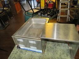 Chef Supreme electric counter top warmer with stainless cover for storing biscuits