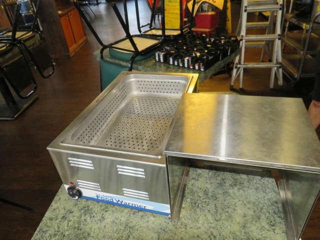 Chef Supreme electric counter top warmer with stainless cover for storing biscuits