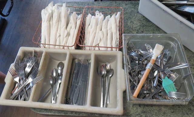 assorted wrapped flatware setups, loose flatware and flatware divider trays