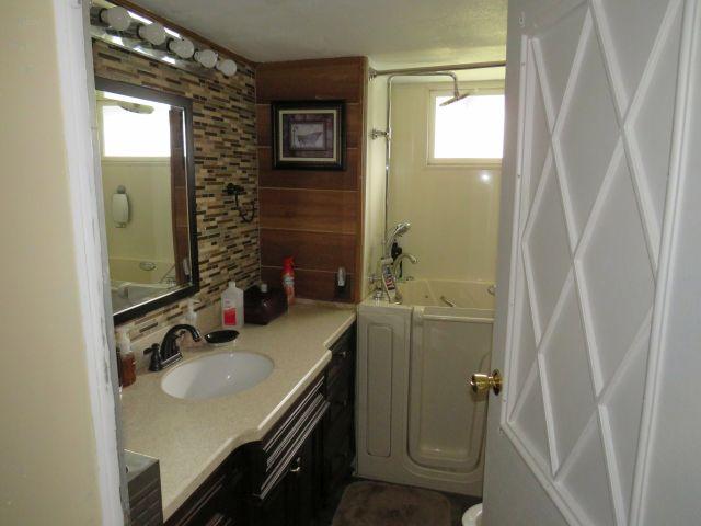 2 bedroom 2 bath remodeled 1970 mobile home with roof over