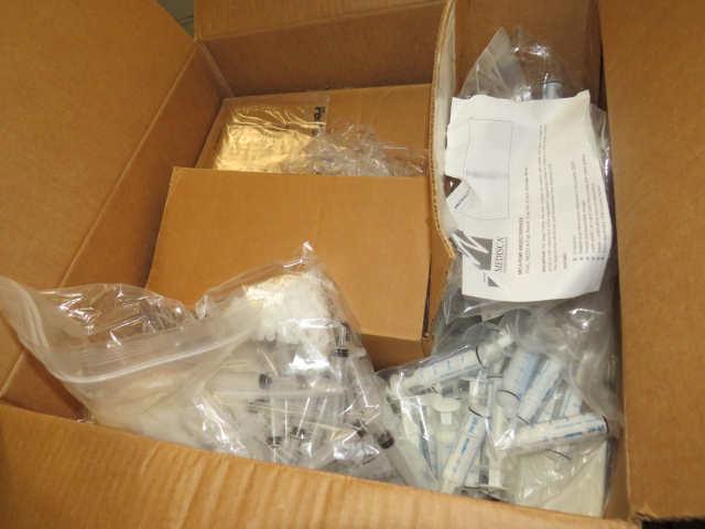 pallet of cases of mixed size  pill bottles and caps, syringes. Capsules, ,