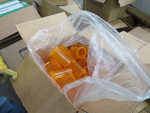 pallet of cases of mixed size  pill bottles and caps, syringes. Capsules, ,