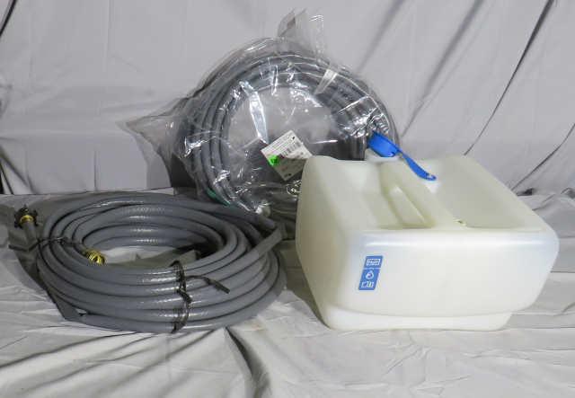 two 50' water hoses and plastic 1 gal tank