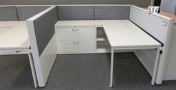 1 sided, 3 station cubicle, 6 ft deep x 19 ft long 3 shelving units, 3 desk tops, 3 filing cabinets