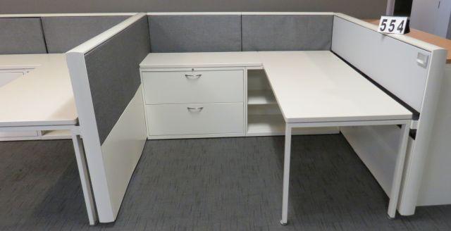1 sided, 3 station cubicle, 6 ft deep x 19 ft long 3 shelving units, 3 desk tops, 3 filing cabinets