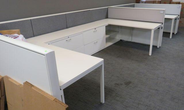 1 sided, 3 station cubicle, 6 ft deep x 19 ft long 3 shelving units, 3 desk tops, 3 filing cabinets