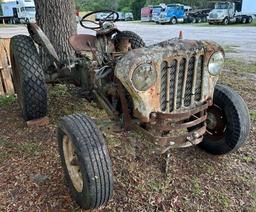 1960's vintage Ford Tractor Rat Rod.  Not running, most sheet metal missing.  Has a Jeep grill.  Bee