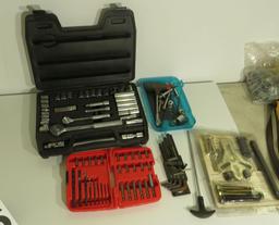 leather contractor bag with mixed tools - drill motor, impact driver, staple gun, trouble light hamm