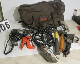 leather contractor bag with mixed tools - drill motor, impact driver, staple gun, trouble light hamm