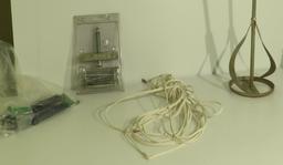 mixed hardware, paint and mud stirrer, remote, extension cord, puller set