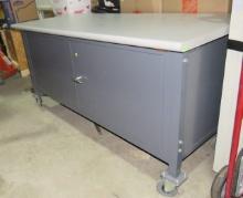 Industrial steel cabinet with Formica top on castors 72" x 30"  adjustable height