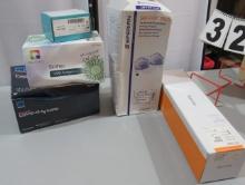 box of respirator masks, covid test kits