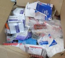 box gauze pads, cotton balls, and other mixed lab supplies