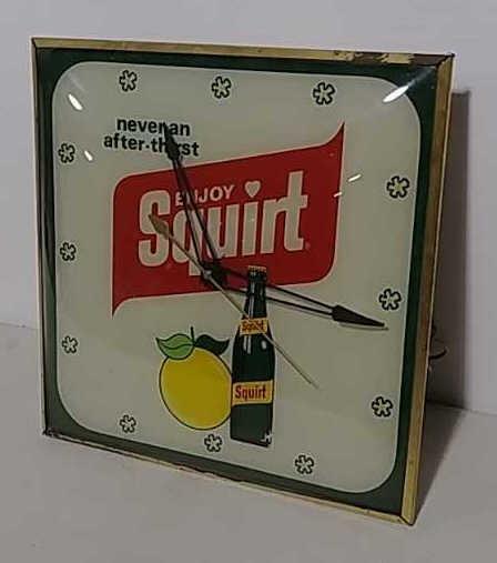 Squirt electric clock
