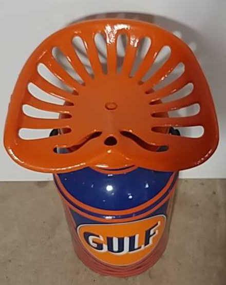 Gulf milk can with tractor seat