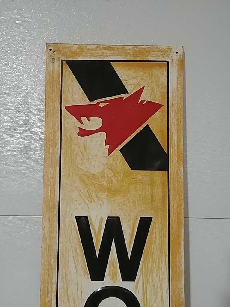 SST Wolf's Head oil embossed sign