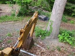 WOODS MODEL 750 3 POINT HITCH BACKHOE ATTACHMENT.