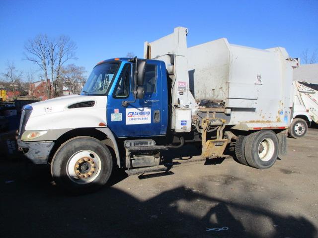 2009 INTERNATIONAL DURASTAR TRUCK WITH WAYNE 10 YD. TOMCAT SERIES SIDE PACKER BODY