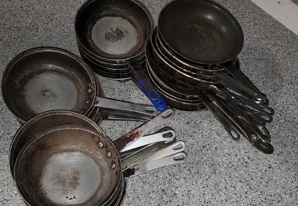 Various Size Used Frying Pans