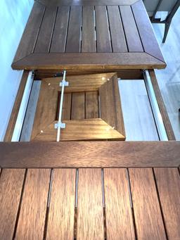 Dining Room Table with Built In Leaf, Powder Coated Frame Finished in  Black with a Teak Table  Top.