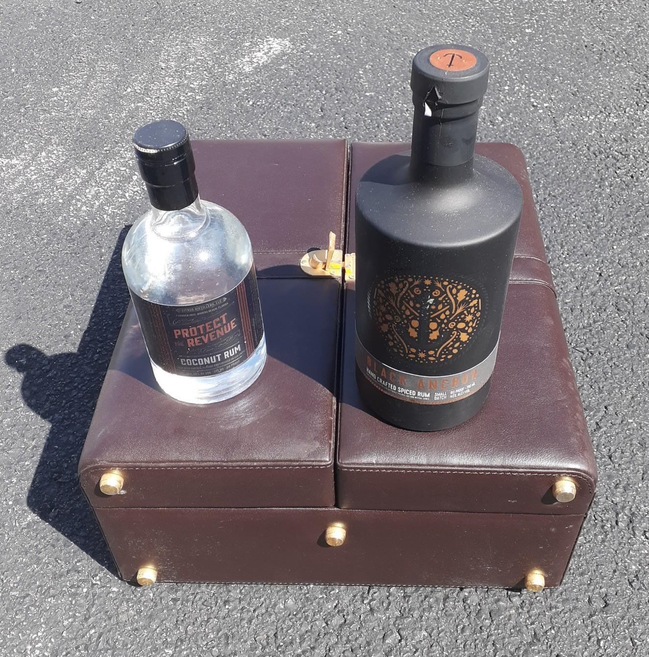 Black Anchor and Protect Revenue Rums with carrying case and Glasses