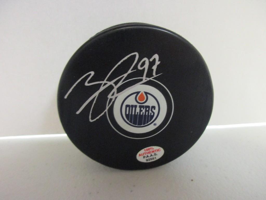 Connor McDavid of the Edmonton Oilers signed autographed logo hockey puck PAAS COA 551