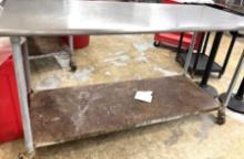 6ft stainless steel worktable on casters