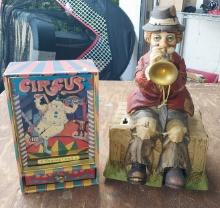 Melody In Motion - Hobo Playing - Bisque Porcelain Music Box and Clown Music Box