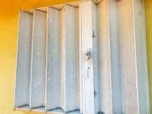 Lot of (19) Accordion Styles Window Shutters. These Shutters are mounted on the home and ready to be