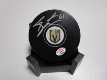 Mark Stone of the Vegas Golden Knights signed autographed logo hockey puck PAAS COA 298