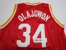 Hakeem Olajuwon of the Huston Rockets signed autographed basketball jersey PAAS COA 542