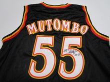 Dikembe Mutombo of the Atlanta Hawks signed autographed basketball jersey PAAS COA 607