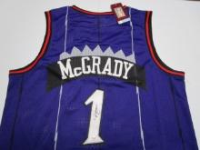 Tracy McGrady of the Toronto Raptors signed autographed basketball jersey PAAS COA 566