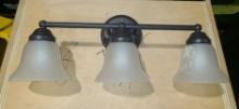 3 light Sconce - one has paint on it