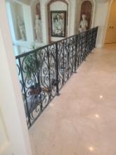 Custom Iron Railing -Second Floor -Approx. 42 in H x 70 ft -various lengths and one curved