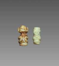Pair Of Pre-Columbian Carved Amulet Beads