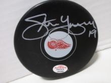 Steve Yzerman of the Detroit Red Wings signed autographed logo hockey puck PAAS COA 292