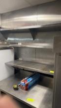 Three assorted size stainless steel wall shelves