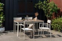 BRAND NEW ORIGINAL PACKAGING 59" BY 35" OUTDOOR ALUMINUM TABLE WITH 4 STACKING ALUMINUM CHAIRS