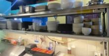 9 foot stainless steel double over shelf with 48 inch heat lamp and two dupe racks
