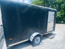 12 foot enclosed trailer with side, entry door, rear ramp and window for food service. This trailer