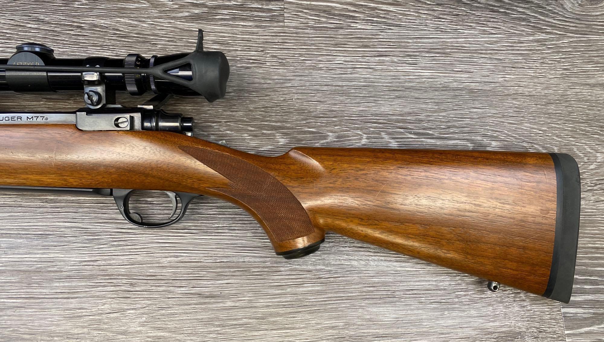 RUGER MODEL M77 .270 WIN CALIBER BOLT-ACTION RIFLE W/LEUPOLD ADJUSTABLE VARI-X 3X9 COMPACT SCOPE.