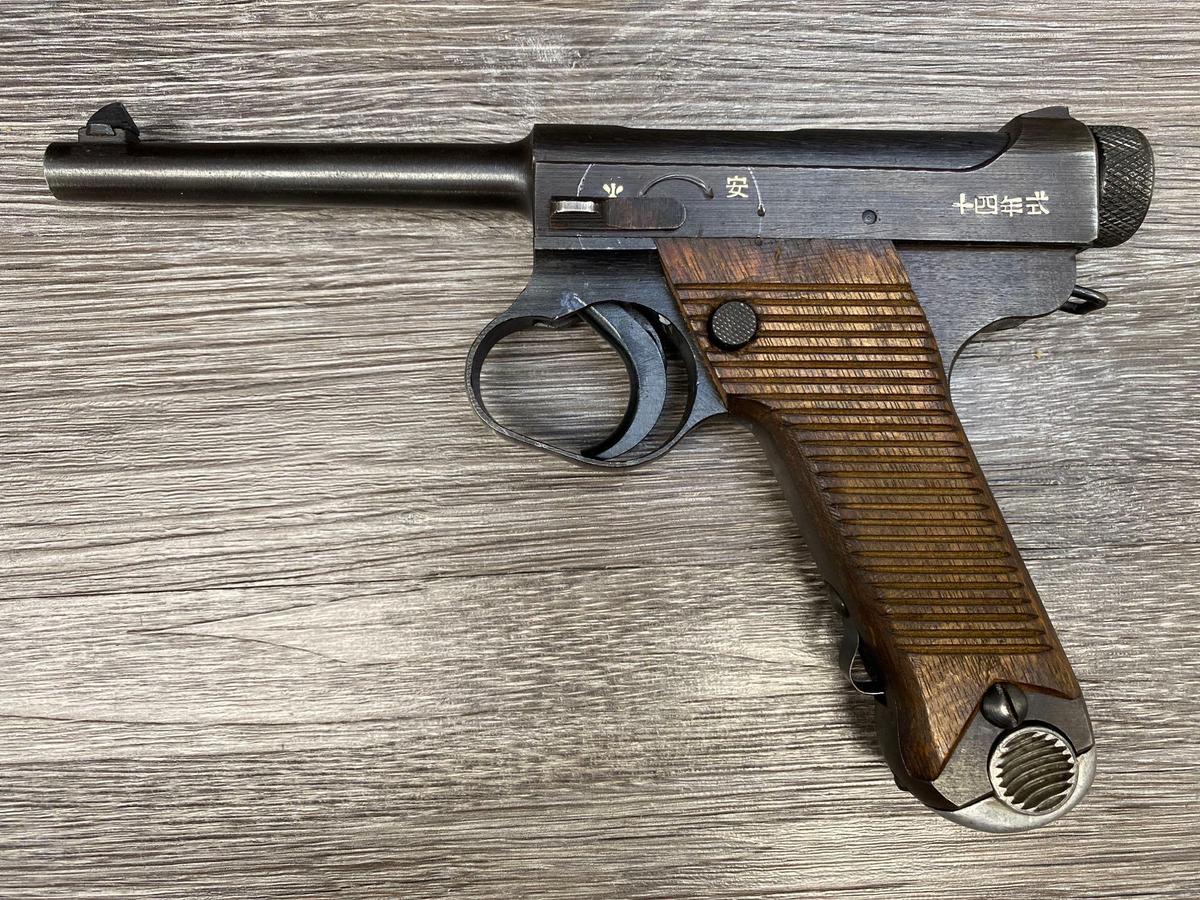 WW II JAPANESE NAMBU TYPE 14 SEMI-AUTO PISTOL 8MM NAMBU DATED 1944