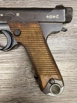 WW II JAPANESE NAMBU TYPE 14 SEMI-AUTO PISTOL 8MM NAMBU DATED 1944