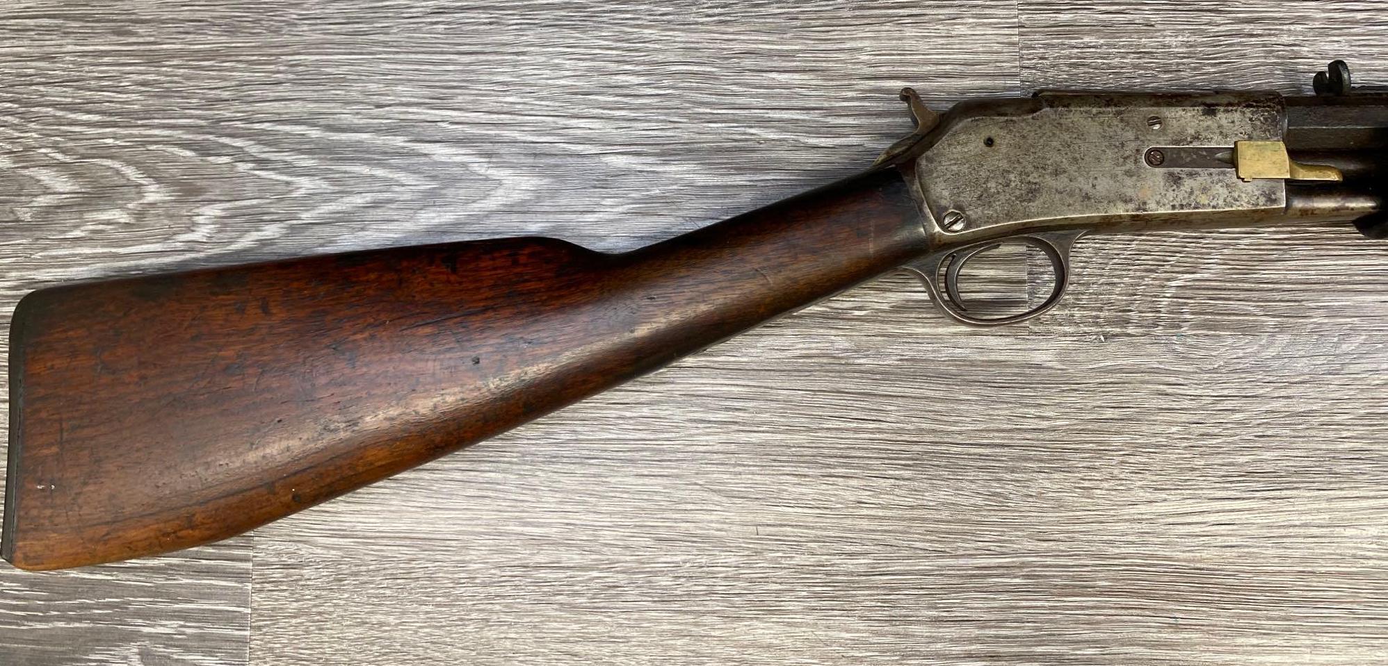 COLT LIGHTNING SLIDE ACTION RIFLE .22 CALIBER, LAST PAT'D DATE ON BARREL FEB. 22, 1887.