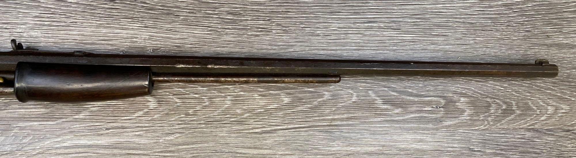 COLT LIGHTNING SLIDE ACTION RIFLE .22 CALIBER, LAST PAT'D DATE ON BARREL FEB. 22, 1887.